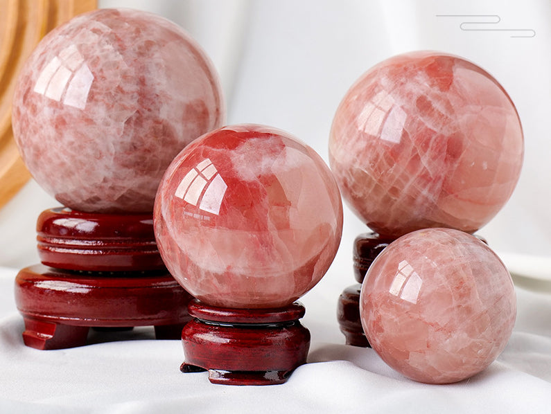 Red calcite crystal ball/sphere